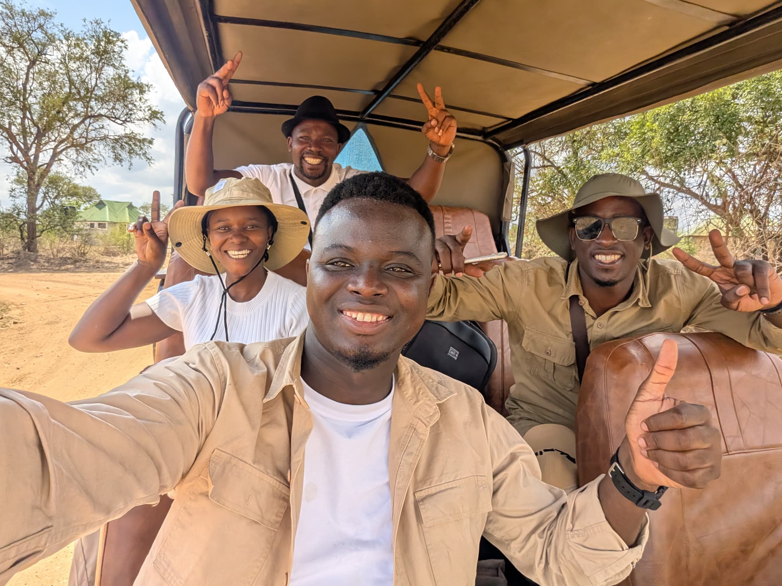 Kai Tours and Safaris branded safari jeep on a game drive at Mikumi National Park, Tanzania