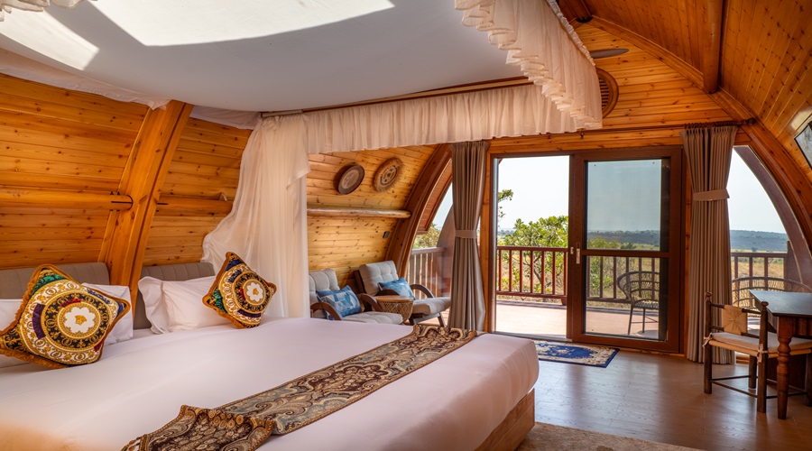 The view of A Kingsize Bedroom with nature in one Photo