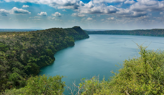Scenic view of Lake Chala crater lake on the Tanzania-Kenya border near Moshi, a popular short tour destination near Kilimanjaro