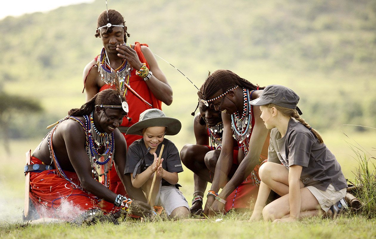 Maasai village tour near Kilimanjaro with traditional Maasai huts, cultural dance, and local community experience in Tanzania